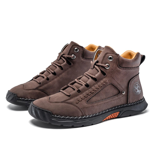 A pair of Flyland men's ankle boots in brown. Stylish high top lace up design suitable for jeans and casual wear.