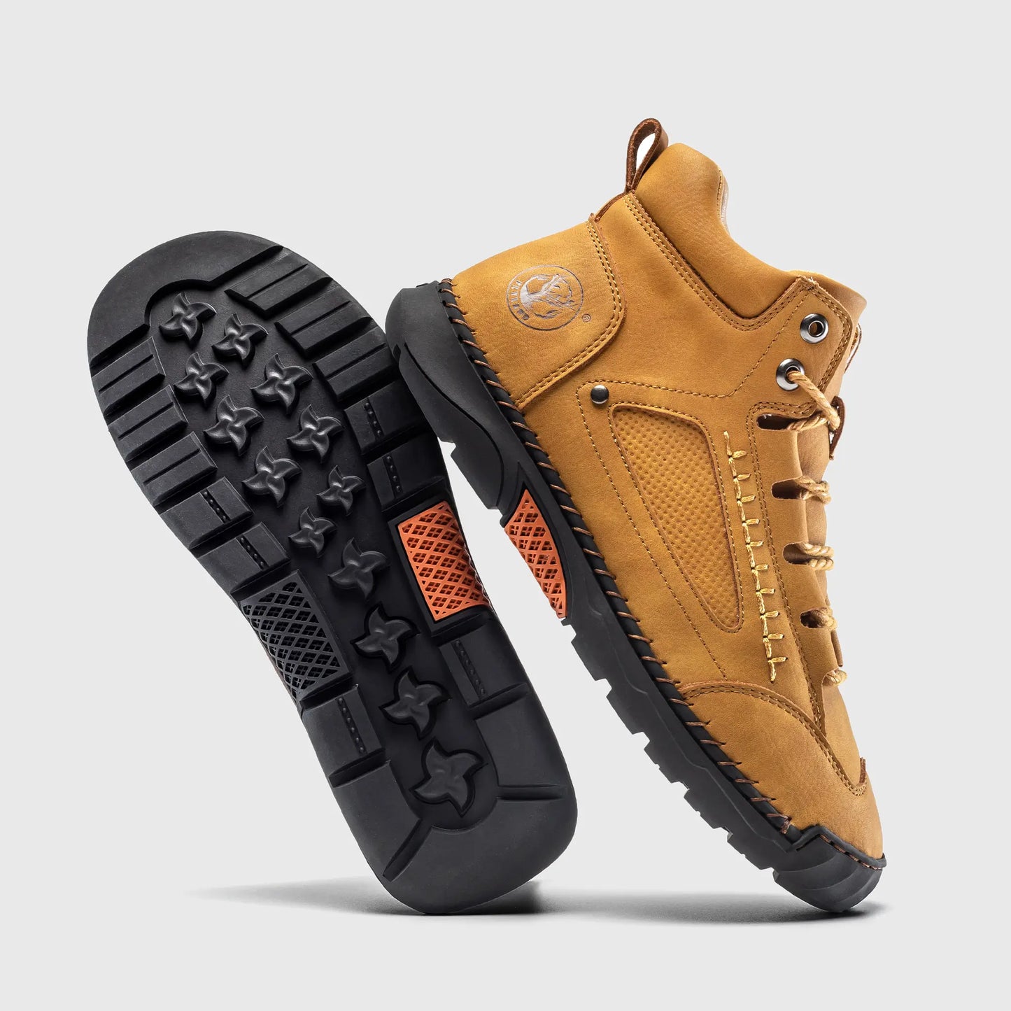 Rubber outsole of Flyland wheat boots showing the grip pattern designed for urban walking.