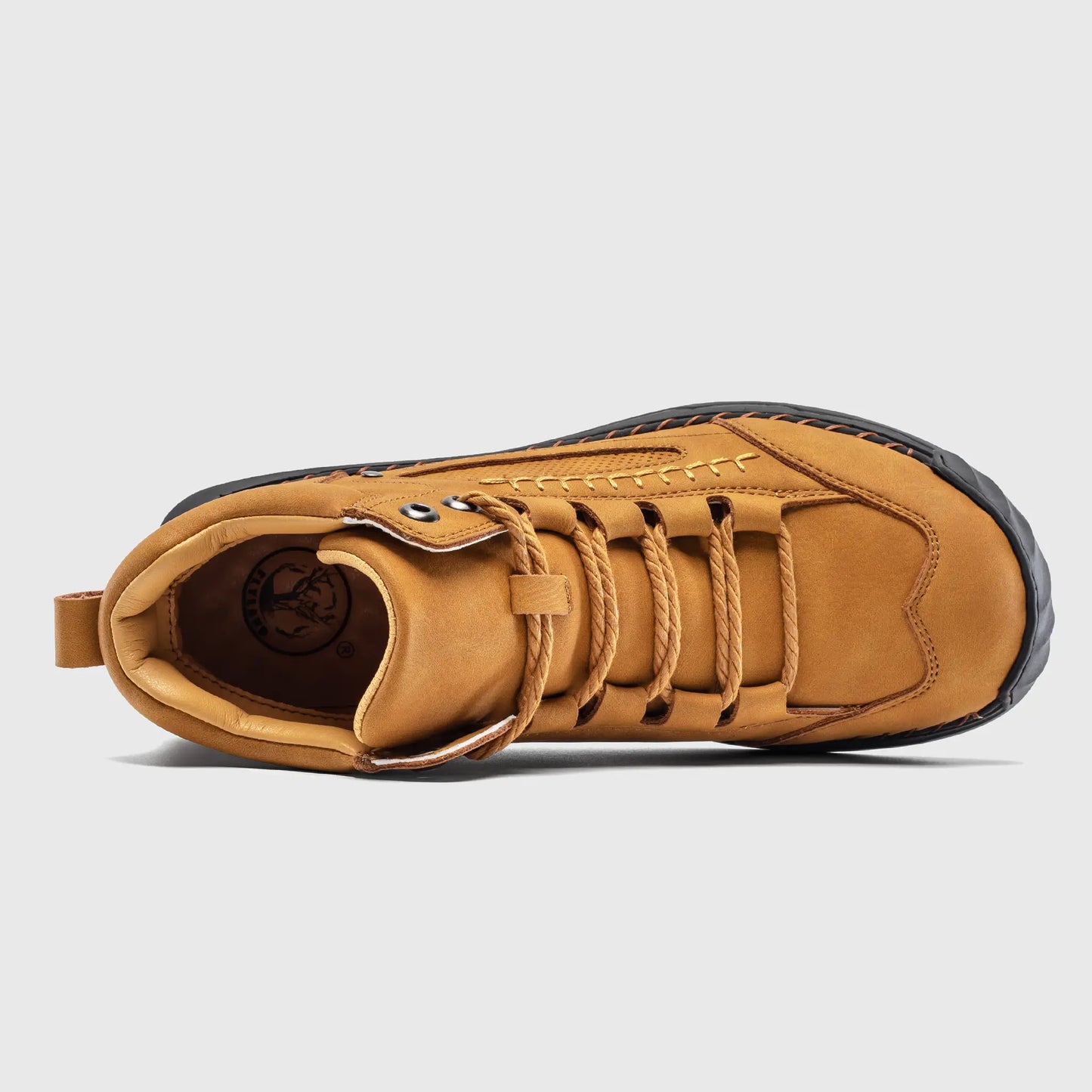 Top down view into the Flyland wheat ankle boots showing the padded collar and breathable interior.