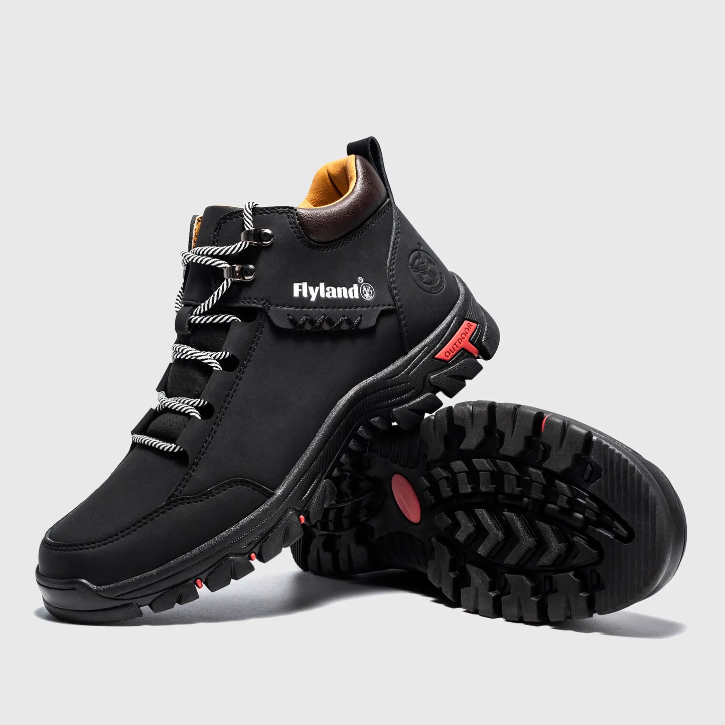 Angled view of Flyland black men's boots featuring a versatile plain toe design suitable for uniforms or street style.