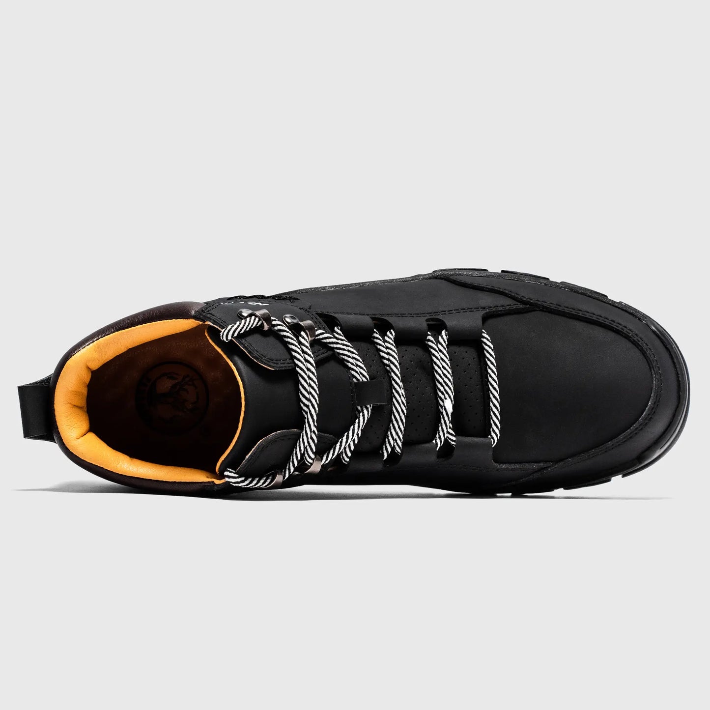 Top down view of black Flyland Land7728 boots showing cushioned padded collar and breathable lining.