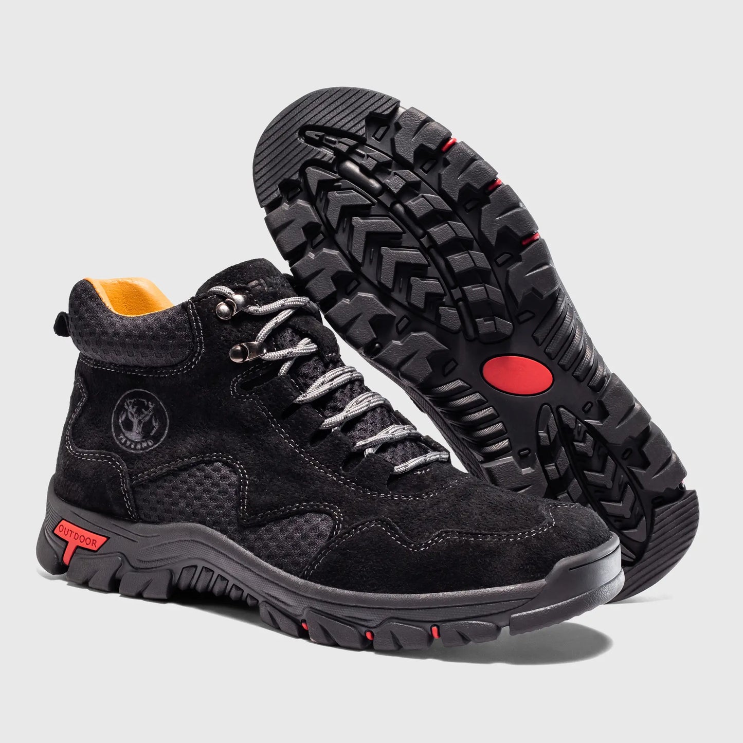 Durable non-slip outsole of Flyland black men's outdoor boots, providing excellent traction for walking.