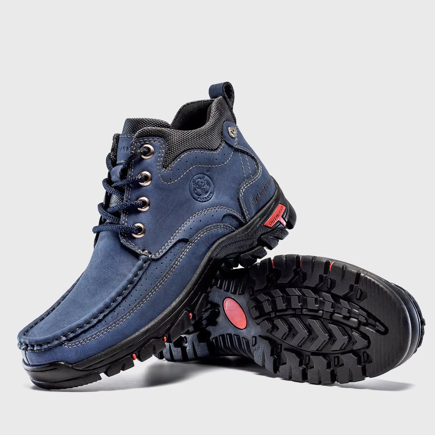Non-slip rubber outsole traction of Flyland Land2511 blue leather boots.