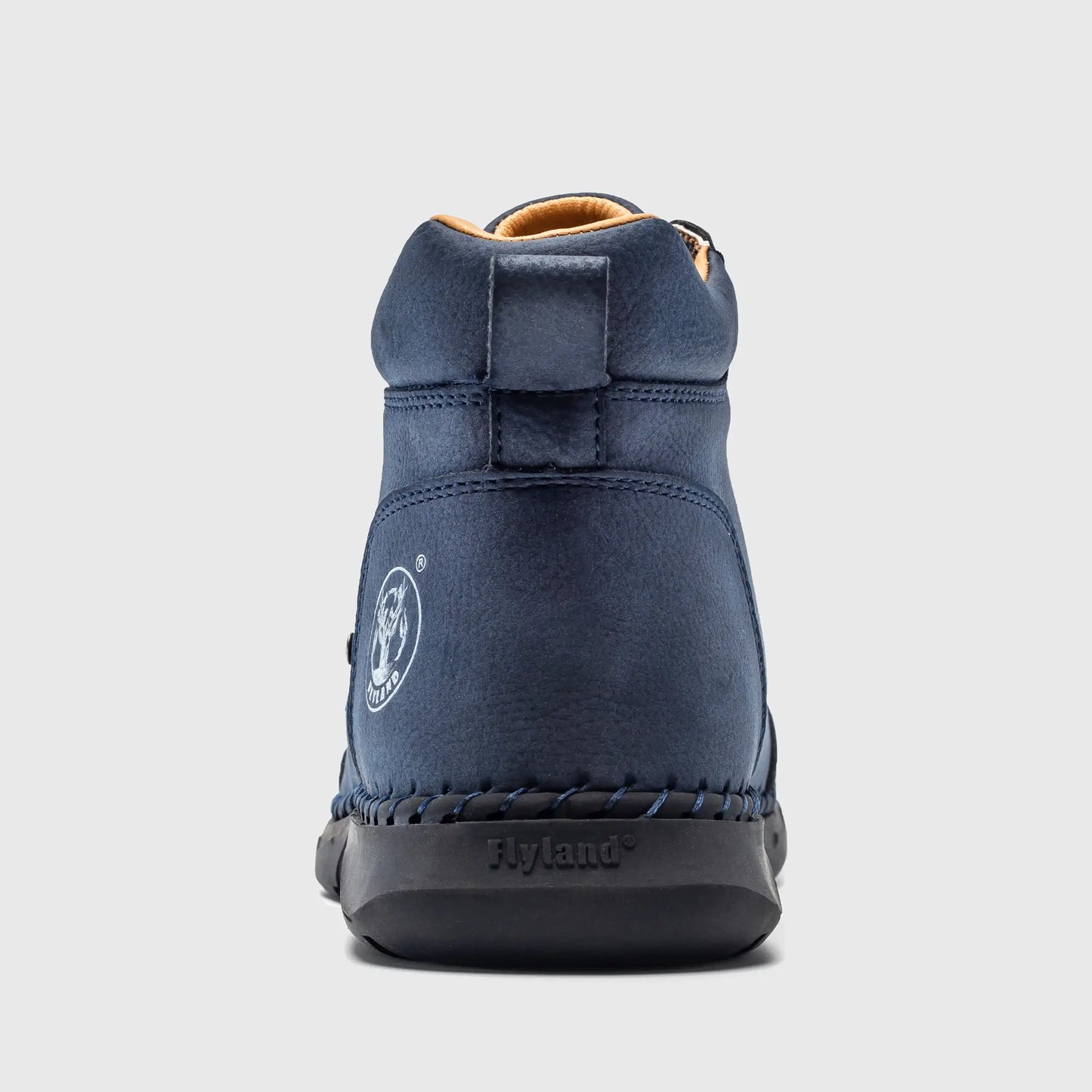 Back view of Flyland men's casual boots showing the reinforced heel support and the embossed brand logo.