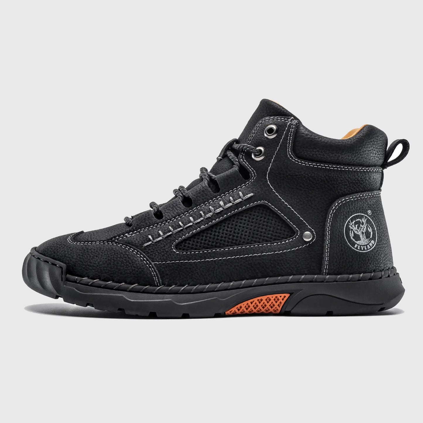 Flyland men's casual boots in black. Side profile highlighting the stylish white contrast stitching and plain toe design.