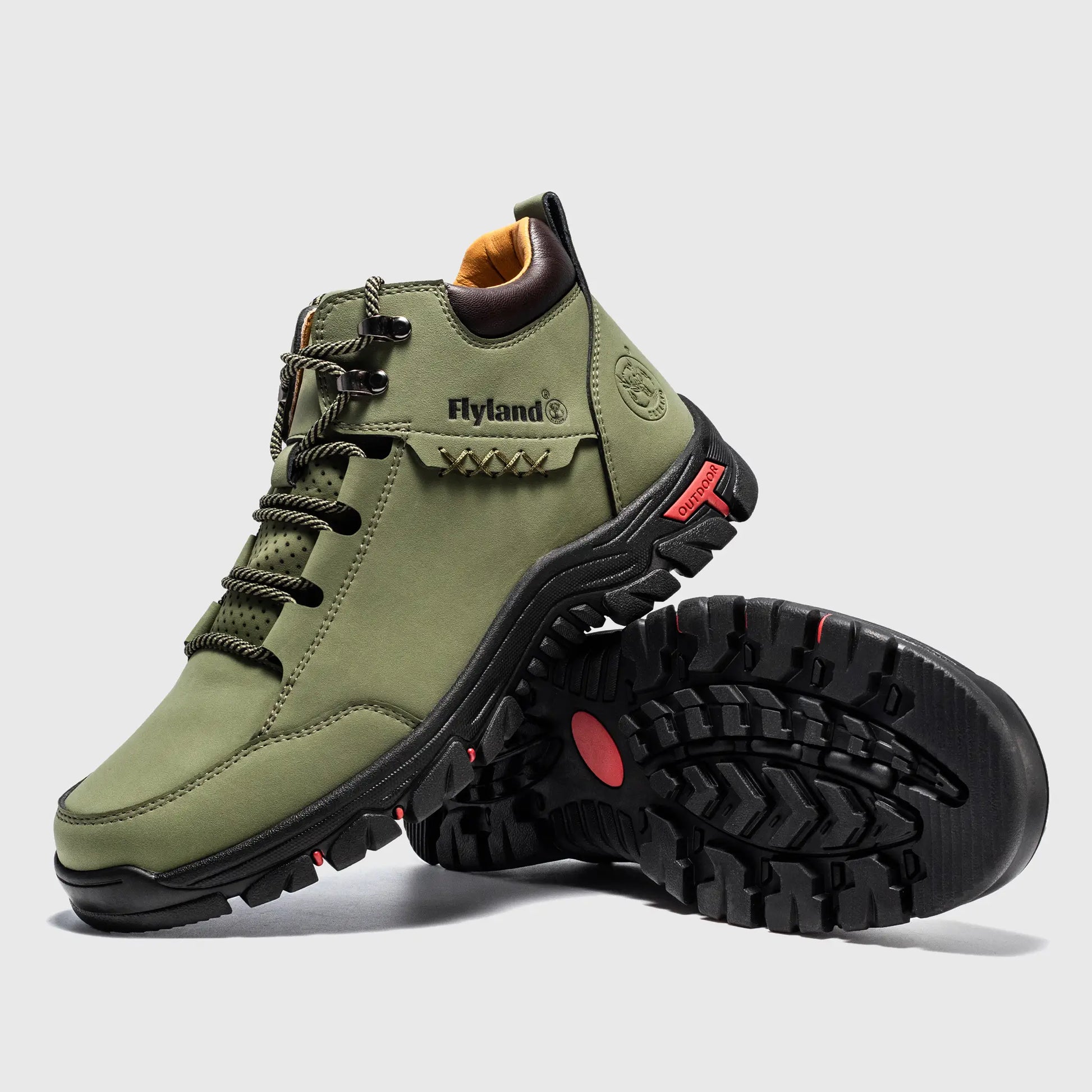 Detailed side view highlighting the modern sole design and metal D-ring eyelets of Flyland sage gray men's boots.