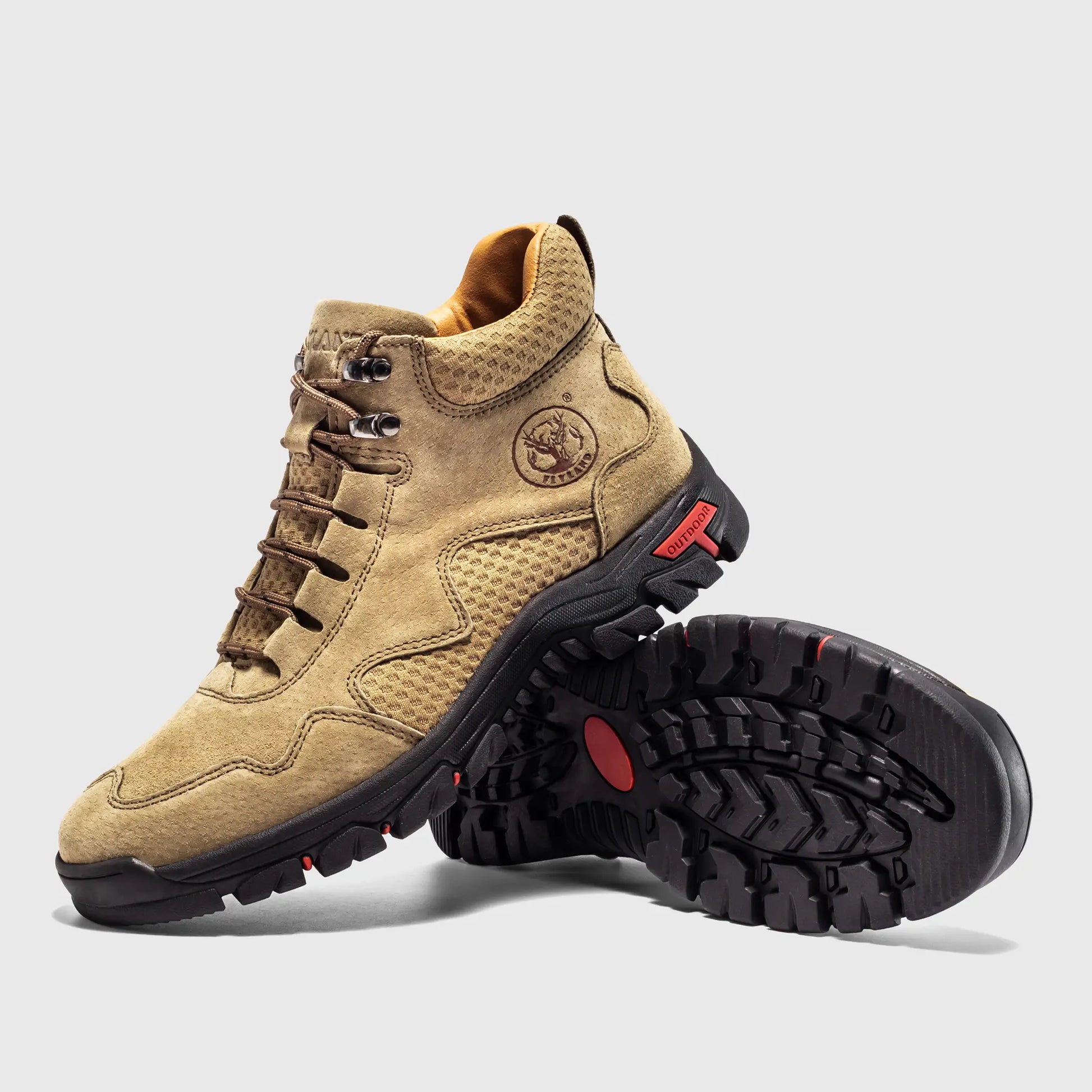 Angled detail view highlighting the real suede texture and mesh panels of these tan sneaker boots.