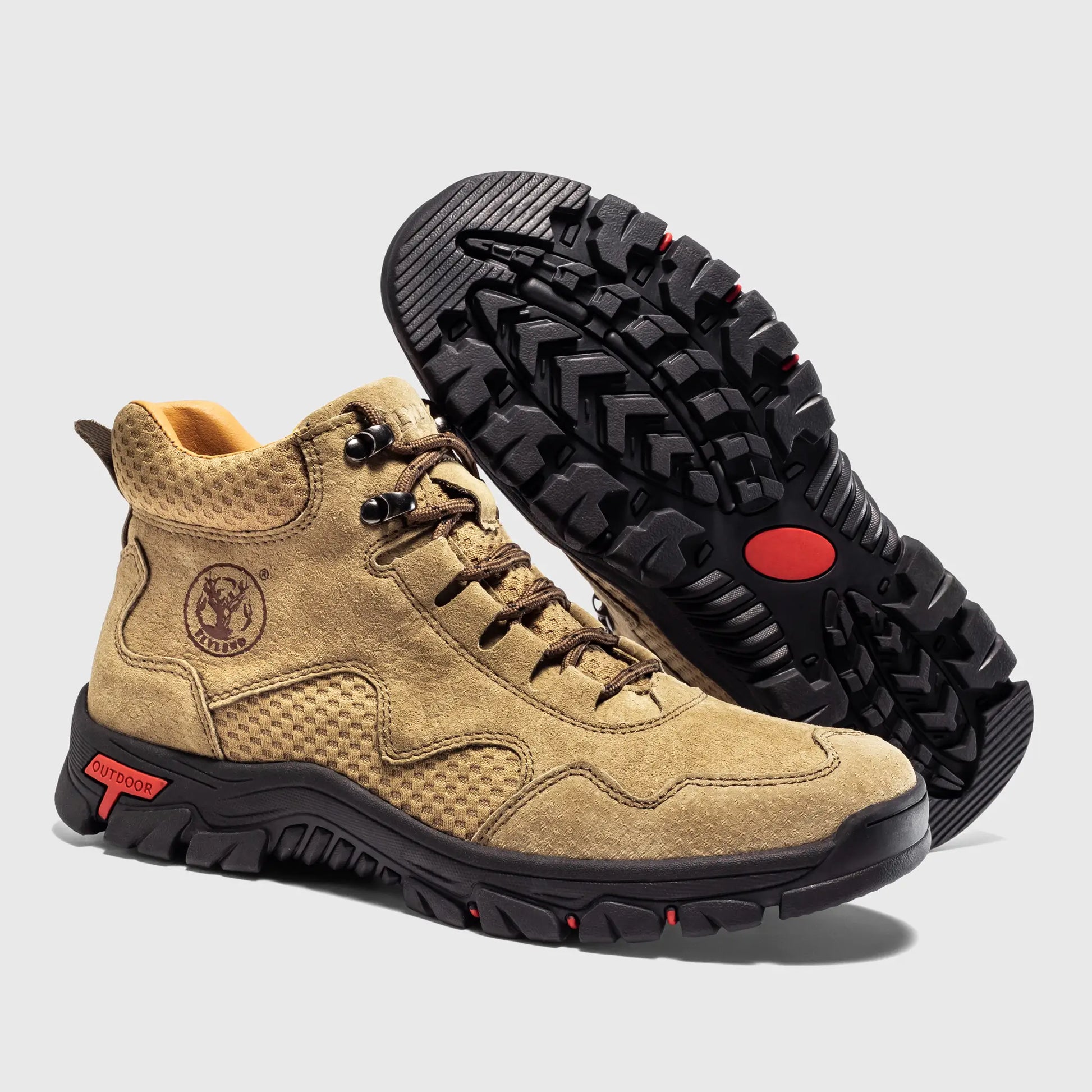 Durable non-slip rubber outsole of Flyland tan suede boots, designed as lightweight outdoor boots for walking.