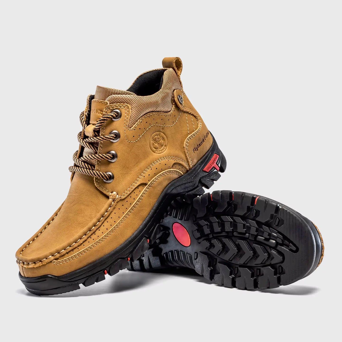 Non-slip rubber outsole traction of Flyland Land2511 soft toe boots, suitable for long standing hours.