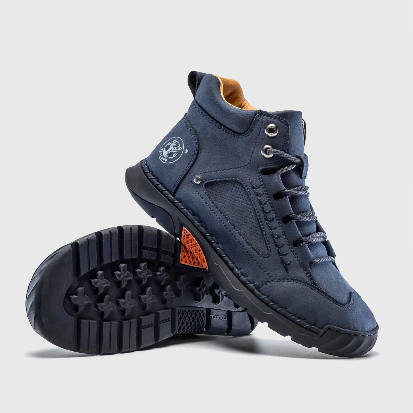 Bottom view of Flyland plain toe boots. These shoes combine a classic soft toe work boot look with a sneaker bottom.