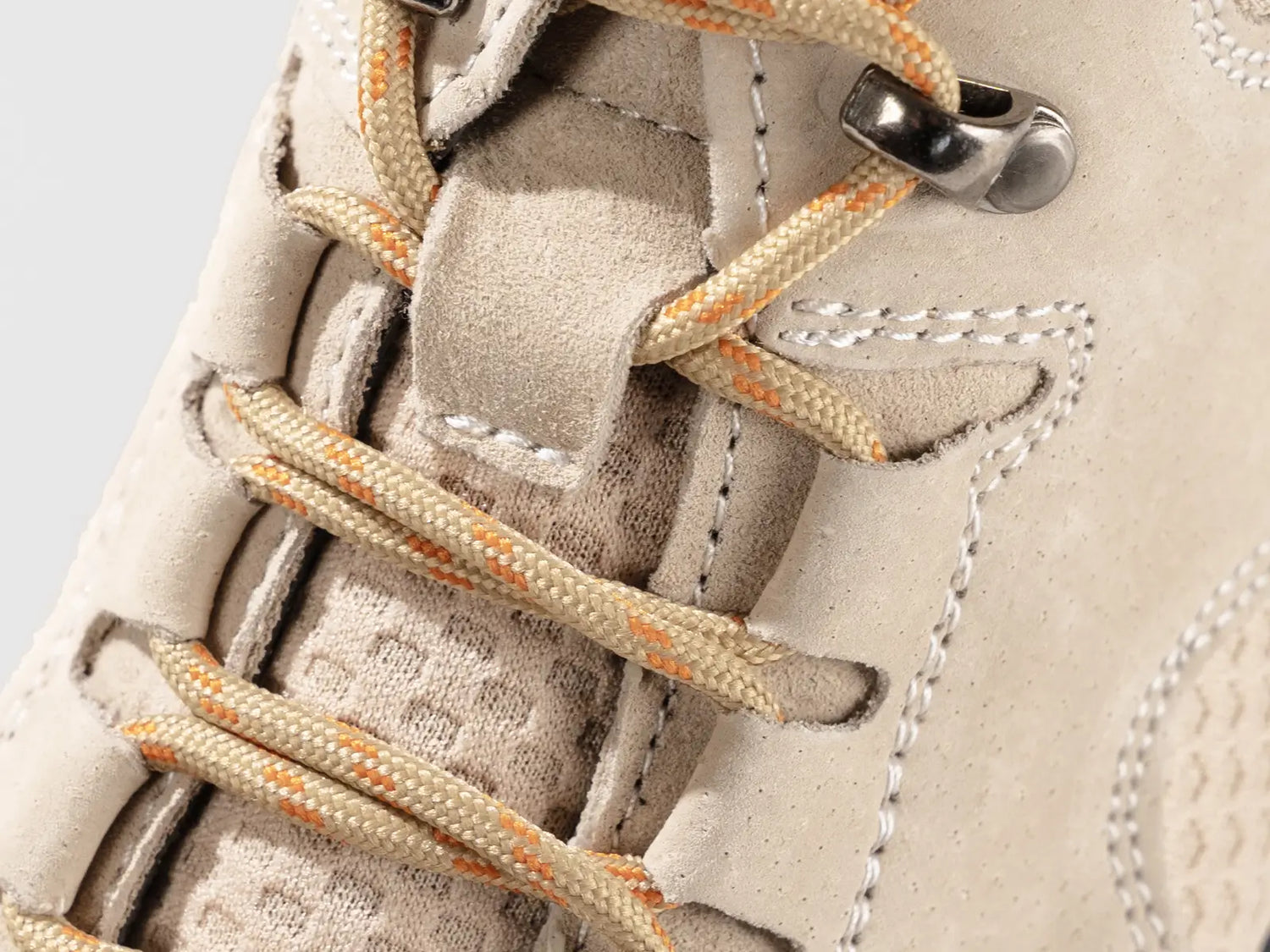 Close-up detail of Flyland sneaker boots featuring premium suede material and durable laces, designed to pair perfectly with shorts, jeans, and cargo pants.